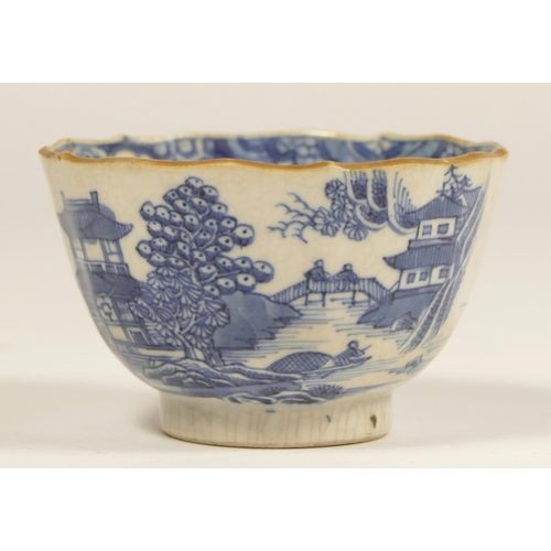 182 - An 18th century Caughley tea cup, with pagoda decoration, a matching slop bowl, repaired and a simil... 