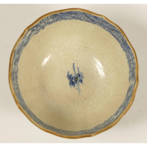 182 - An 18th century Caughley tea cup, with pagoda decoration, a matching slop bowl, repaired and a simil... 