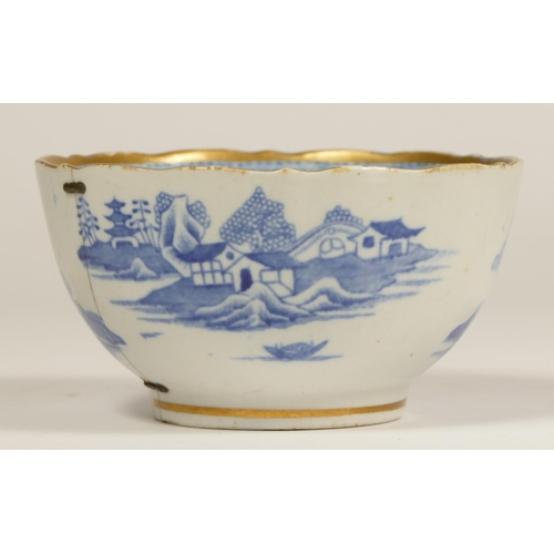 182 - An 18th century Caughley tea cup, with pagoda decoration, a matching slop bowl, repaired and a simil... 