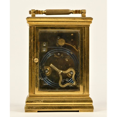 203 - A late 19th century brass striking carriage clock, Roman numerals, striking the hours and half on a ... 