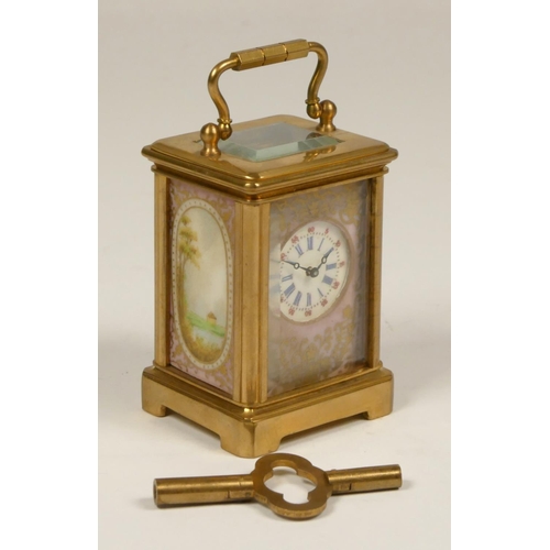 205 - A 19th century French brass miniature timepiece, the dial with blue Roman numerals and red Arabic mi... 