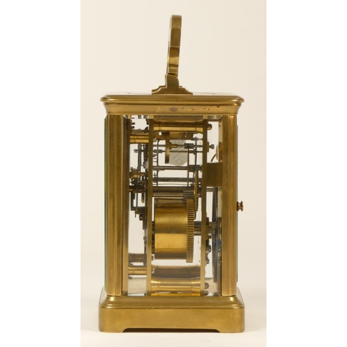 206 - A late 19th century brass striking carriage clock, Arabic numerals, striking the hours and half on a... 