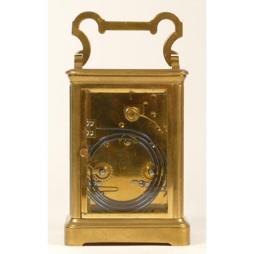 206 - A late 19th century brass striking carriage clock, Arabic numerals, striking the hours and half on a... 