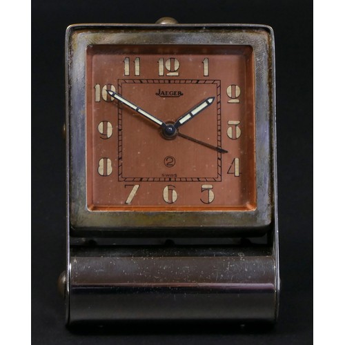 208 - Jaeger Travel Clock, Switzerland, mid-20th century, the copper dial with luminous Arabic numerals, i... 