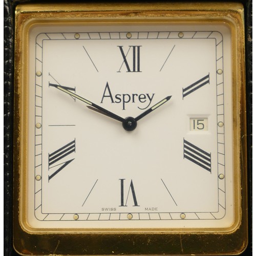 211 - Asprey, a leather folding travel alarm with date quartz clock, model 2576, 6.5 x 4.5 x 1.5cm.