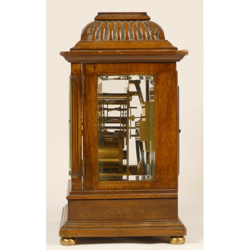 213 - A late 19th Century German walnut 8 day bracket clock, the silvered dial with Roman numerals and fas... 