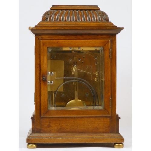 213 - A late 19th Century German walnut 8 day bracket clock, the silvered dial with Roman numerals and fas... 