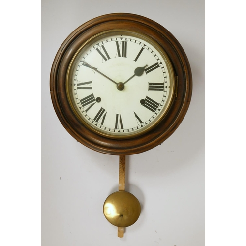 214 - A late 19th Century school house oak wall clock, the 10