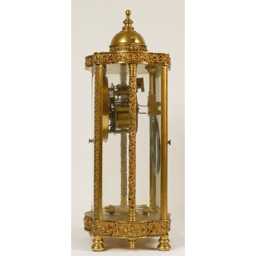 222 - A 19th Century French brass four glass and gilt metal eight day mantel clock, with ornate cast detai... 