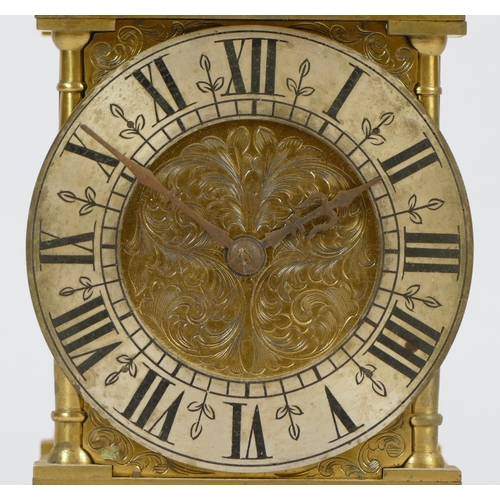 225 - A late 19th Century brass lantern clock, the silvered dial with Roman numerals, the French movement ... 