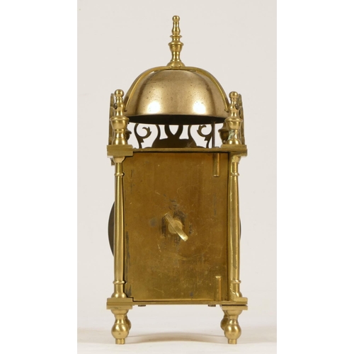 225 - A late 19th Century brass lantern clock, the silvered dial with Roman numerals, the French movement ... 