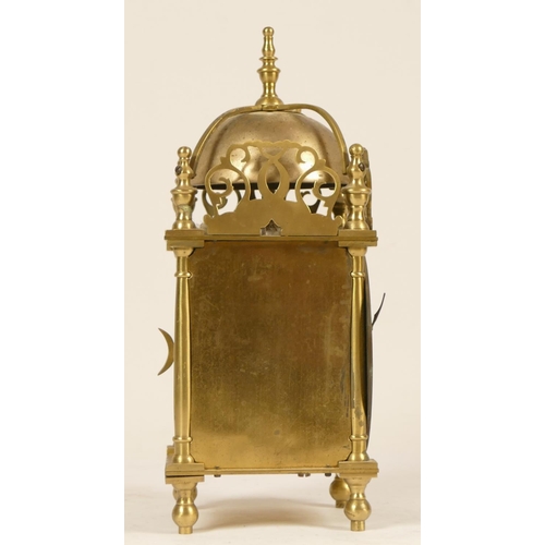 225 - A late 19th Century brass lantern clock, the silvered dial with Roman numerals, the French movement ... 