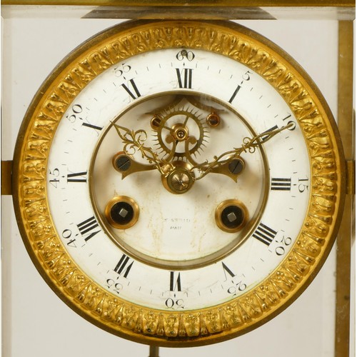 226 - Samuel Marti et Cie, Paris, a late 19th century brass four glass mantel clock, the white enamel two ... 