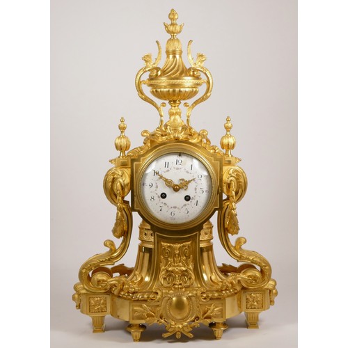 227 - Samuel Marti et Cie, Paris, a late 19th century French ormolu mantel clock, the white enamel dial wi... 