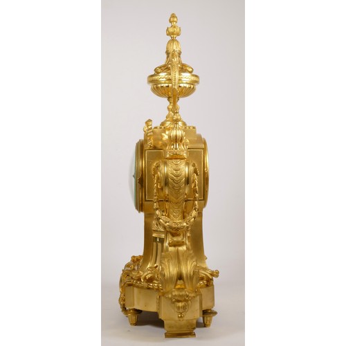 227 - Samuel Marti et Cie, Paris, a late 19th century French ormolu mantel clock, the white enamel dial wi... 