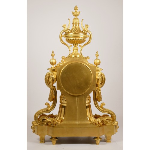 227 - Samuel Marti et Cie, Paris, a late 19th century French ormolu mantel clock, the white enamel dial wi... 