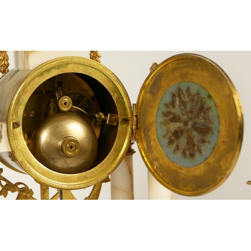 232 - Japy Freres et Cie, Paris, a late 19th century French clock garniture, with columns, sunburst pendul... 