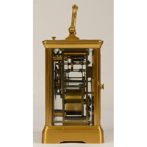 207 - A late 19th century brass striking carriage clock, Arabic numerals, striking the hours and half on a... 