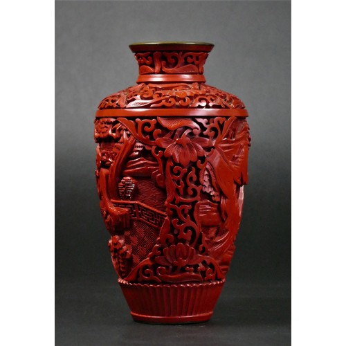 154 - A Chinese carved cinnabar baluster vase, with blue enamel interior, 15.5cm