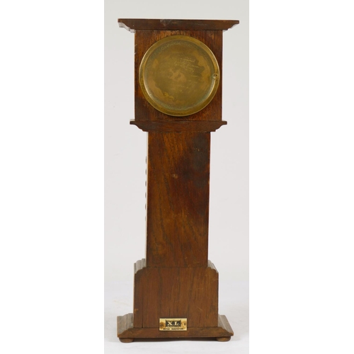 234 - A late 19th Century oak miniature longcase clock, by X.L the movement by Hamburg American Clock Comp... 