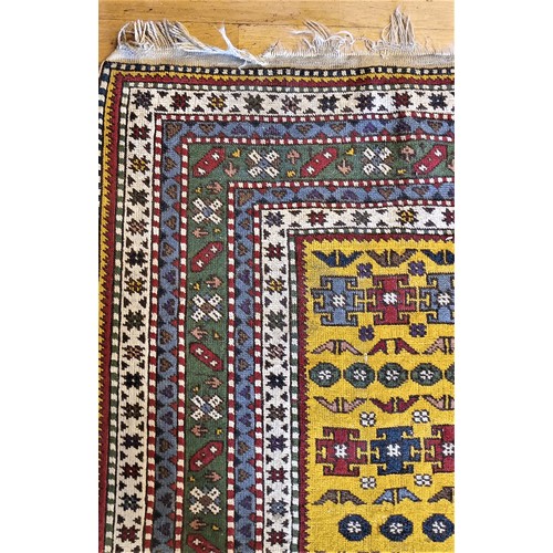 271 - A Turkish Konya runner, with guls on a yellow field, multi layered border, 295 x 85cm.
Sold with a p... 