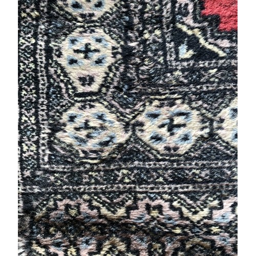 280 - A Persian Qashkai rug, 146 x 107cm and two other rugs.