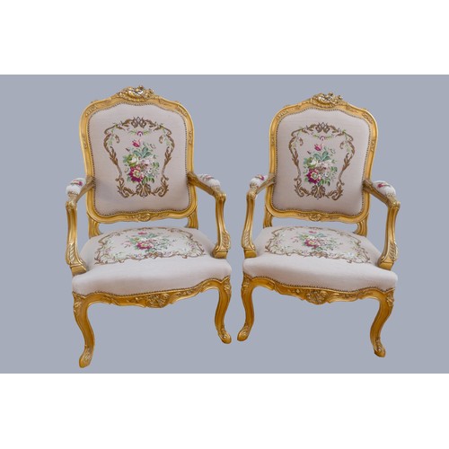 291 - A Louis XV style giltwood and petite point embroidered salon suite, comprising three seat sofa with ... 