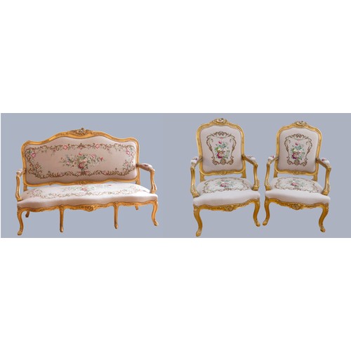 291 - A Louis XV style giltwood and petite point embroidered salon suite, comprising three seat sofa with ... 