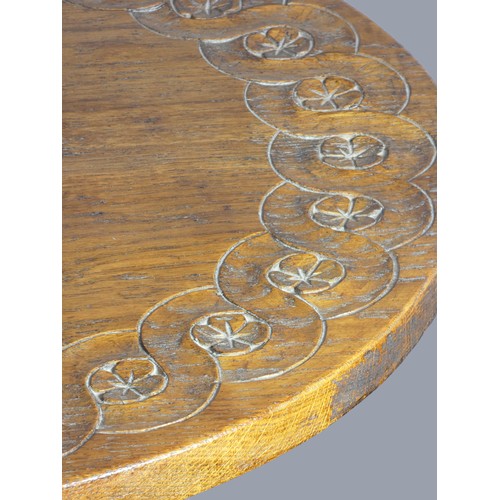 295 - Thomas Gnomeman Whittaker (1910-1991), of Littlebeck, an oak coffee table, circular top carved with ... 