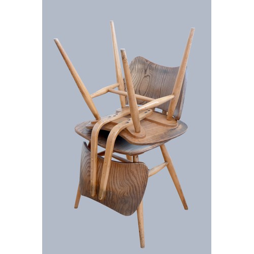 301 - Lucian Ercolani-Ercol, a set of four c.1960's beech and elm side/dining chairs, model 401, having th... 