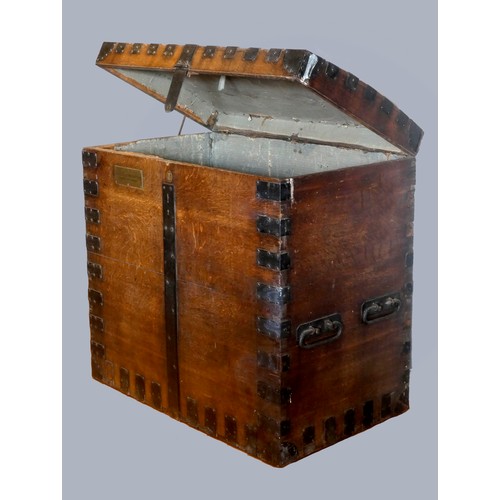 309 - Of Indian Civil Service interest; a Victorian large oak and iron bound slightly domed silver trunk, ... 