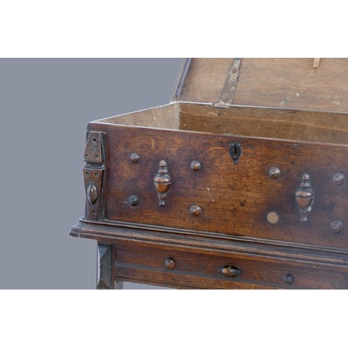 312 - A second half of the 17th century oak bible box, with plank top over a front with applied mouldings,... 