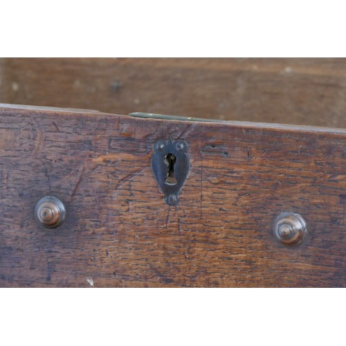 312 - A second half of the 17th century oak bible box, with plank top over a front with applied mouldings,... 