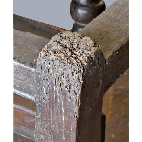 313 - A late 17th century oak gate leg table, with associated rectangular plank top, raised on baluster le... 