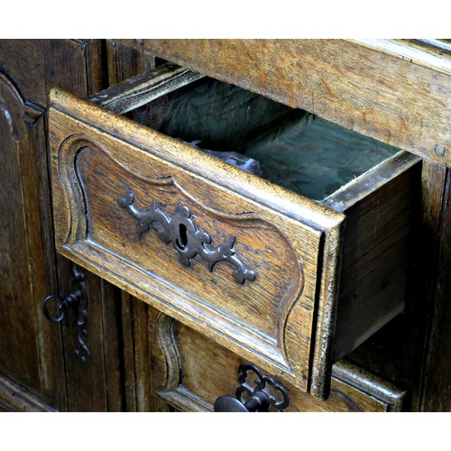 319 - A good 18th century French ok dresser, believed Nancy/Metz region, with a three shelf rack with shap... 