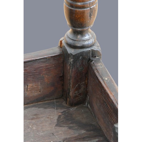 321 - A 17th century oak joint stool, with plank top and thumb nail edge, line incised frieze, on turned b... 