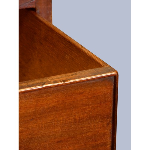 323 - A George III mahogany kneehole desk, with shaped top, pull out writing slide, over a single frieze d... 