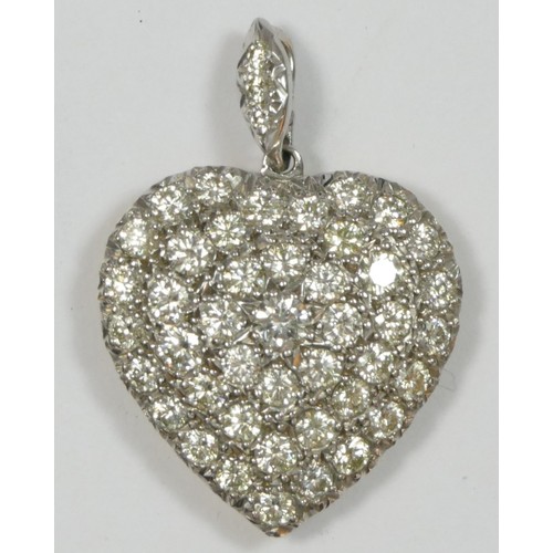 65 - A diamond set heart pendant, pave set with 43 brilliant cut stones, approximate weight 3.40cts, colo... 