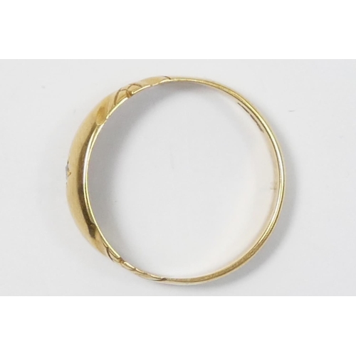An 18ct gold and star gypsy set diamond ring, L 1/2, 2.2gm