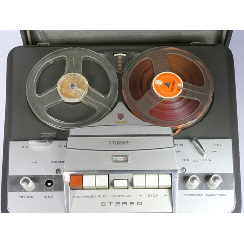 A Philips EL 3534 reel to reel tape recorder. Portable with reels, together  with a collection of ov
