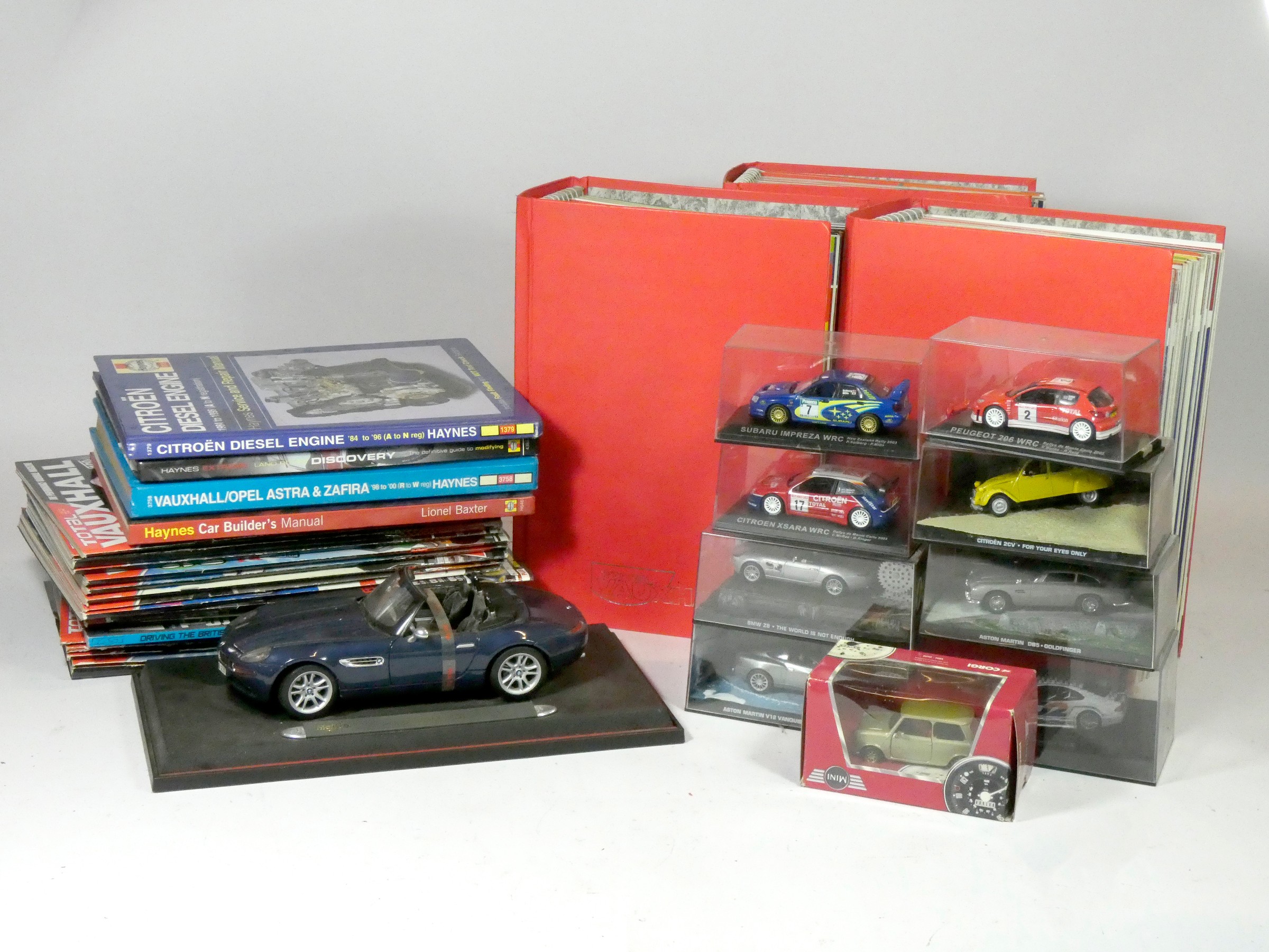 Eight diecast vehicles, including part works models from James Bond
