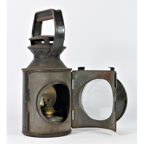 89 - A B.R three aspect hand lamp, complete with burner, 30cm tall