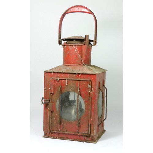 97 - An unmarked hand lamp, complete with burner, 49cm tall