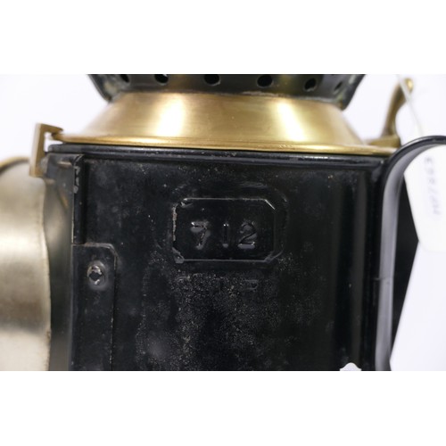 111 - GWR three aspect handlamp, body stamped GWR 712, with GWR burner.