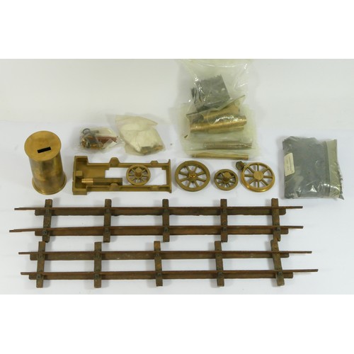 140 - A brass model kit of a train, wooden track, unsure if complete