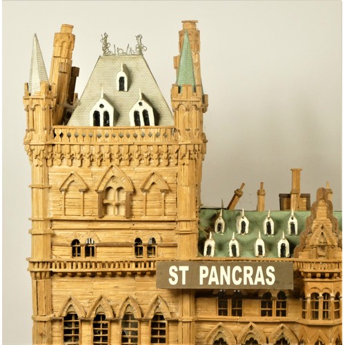 141 - A matchstick scratch built model of St Pancras Hotel, Euston Rd, London, with decorated roof tiles, ... 