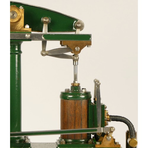 179 - A Stuart Turner stationery beam engine comprising of green body with vertical single cylinder engine... 