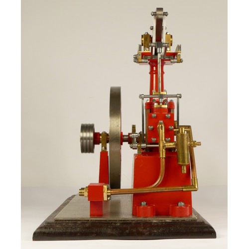 180 - A Stuart Turner stationery beam engine comprising of red body with vertical single cylinder engine w... 