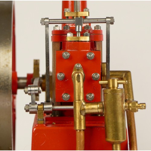 180 - A Stuart Turner stationery beam engine comprising of red body with vertical single cylinder engine w... 