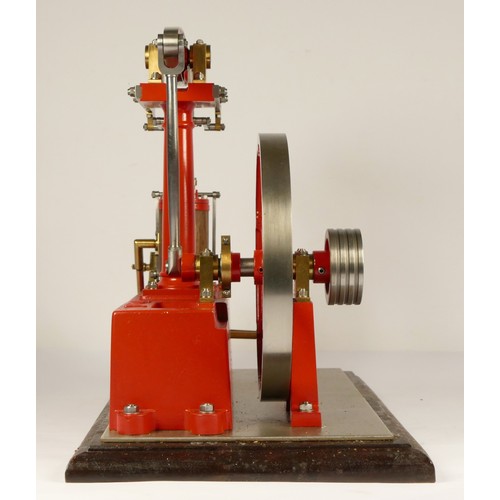 180 - A Stuart Turner stationery beam engine comprising of red body with vertical single cylinder engine w... 